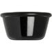 A close-up of a black Carlisle ramekin with a black rim.