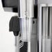 A close-up of a Vollrath stainless steel cup dispenser tube on a white background.