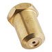 A close-up of a brass cylinder with a threaded brass nozzle and a hole in the middle.