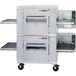 A large stainless steel Lincoln Impinger conveyor oven with two belts.