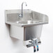 A stainless steel Eagle Group hand sink with a faucet.