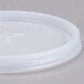 A translucent plastic Cambro lid with a straw slot.