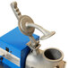 A close-up of a Benchmark USA Snow Bank Snow Cone Machine with a blue handle.