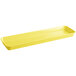 A yellow rectangular Cambro market pan with a handle.