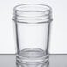 a clear glass with a lid