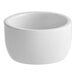 An Acopa bright white porcelain ramekin.