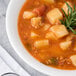 A Reserve by Libbey bone china bowl of potato soup with a sprig of rosemary.