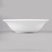 a white bowl on a gray background