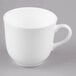 A white bone china tea cup with a handle.