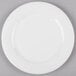 A white Reserve by Libbey bone china dessert plate with a white rim.
