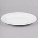 a white plate on a gray background