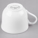 A white Reserve by Libbey bone china coffee cup with a handle.