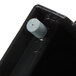 A close-up of a black plastic cylinder with a blue button.