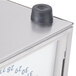 The black knob on a metal box.