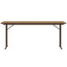 A Correll medium oak folding seminar table with off-set legs.