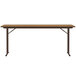 A Correll medium oak rectangular seminar table with off-set metal legs.