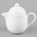 A white Reserve by Libbey bone china teapot with a lid.