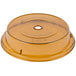 A yellow plastic Cambro Camcover with a hole in it.