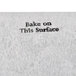 A white TurboChef fiber reinforced baking stone surface with the words "bake on this surface" in black.