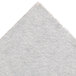 A TurboChef fiber reinforced baking stone with a white surface and a small triangle on it.