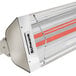 A close-up of the red light on a Schwank 2 stage electric stainless steel outdoor patio heater.