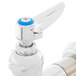 A T&S chrome sink faucet with blue lever handle and blue index.