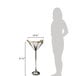 A woman using an American Metalcraft martini wine stand to fill a martini glass.