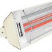 A red and white Schwank electric outdoor patio heater with a red light.