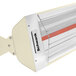 A red and white Schwank electric patio heater with a red light.