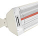 A close-up of a red and white Schwank electric patio heater.