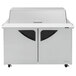 A stainless steel Turbo Air sandwich prep table with two doors and a mega top.