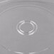 A clear plastic disc with a hole in it.