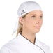 a woman wearing a white hat