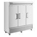 A stainless steel True reach-in freezer with three solid doors.