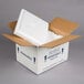 A white foam box inside a white box with a lid.