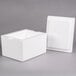 a white foam box with a logo