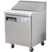 An Avantco stainless steel 1 door refrigerated sandwich prep table.