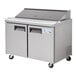 An Avantco stainless steel refrigerated sandwich prep table with two doors.