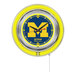 A white wall clock with a yellow and blue University of Michigan logo in neon.