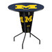 A round black pub table with a University of Michigan Wolverines logo on it.