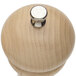 A Chef Specialties wooden pepper mill with a silver knob.