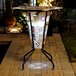 A Holland Bar Stool Indian Motorcycle pub table with a logo on it.