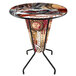 A Holland Bar Stool Indian Motorcycle round bar height pub table with motorcycle logo on the top.