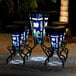 A University of Notre Dame pub table with a blue LED pole on a brick patio.