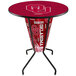 A round metal bar height table with the University of Oklahoma logo on it.