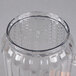 A clear plastic pitcher with a clear lid.