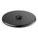 A black circular Lancaster Table & Seating cast iron table base plate with a hole in the center.