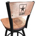 A black steel bar stool with a maple seat and back engraved with the United States Army logo.