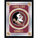 A close-up of a framed Florida State Seminoles logo on a mirror.