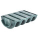 A green polyethylene taco server with four shell compartments.